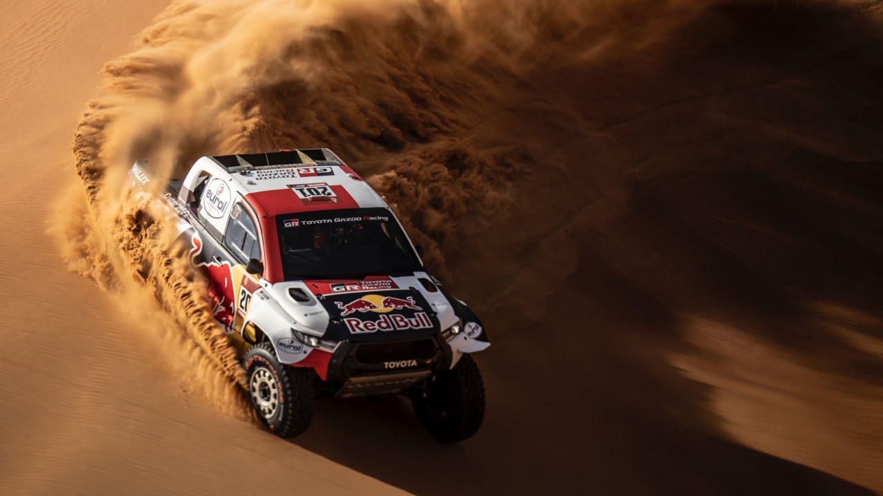 Rally car drifting in the desert