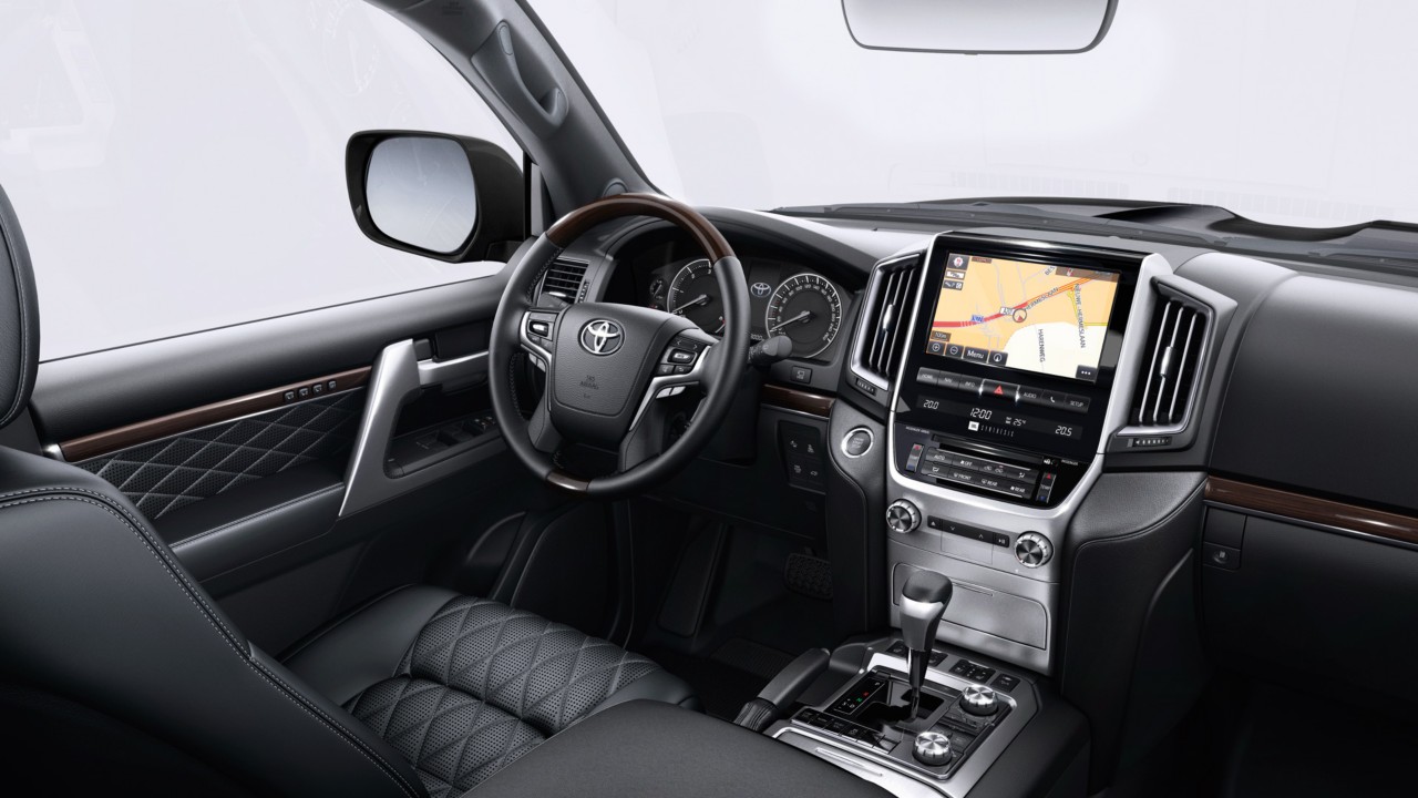 Model shown is Exalibur featuring Black quilted leather and black roof lining trim	