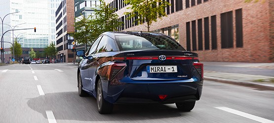 Toyota Mirai driving down the road