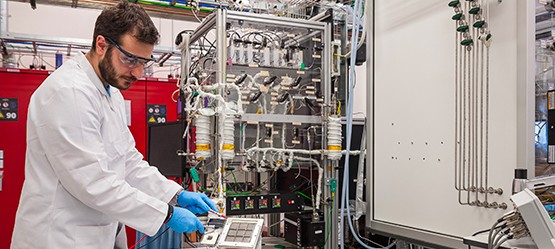 Man in a lab using equipment 