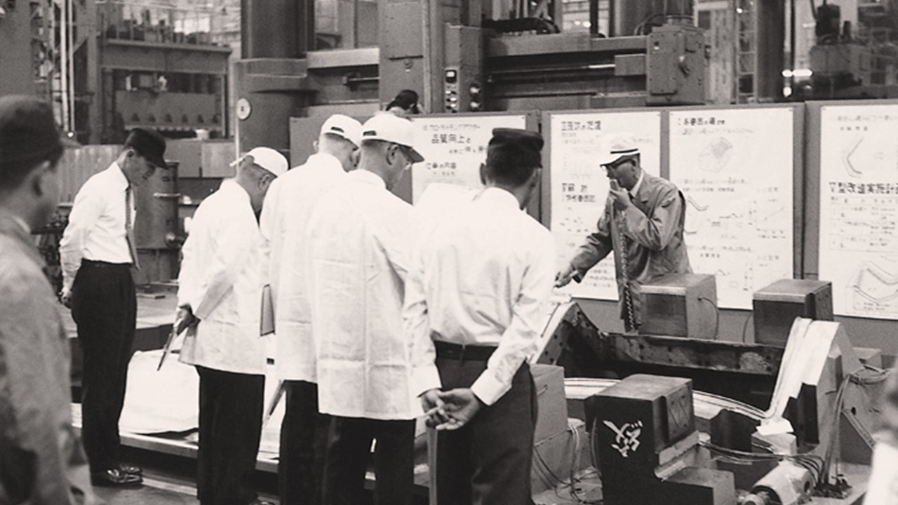 Historic image showing Toyoto employees